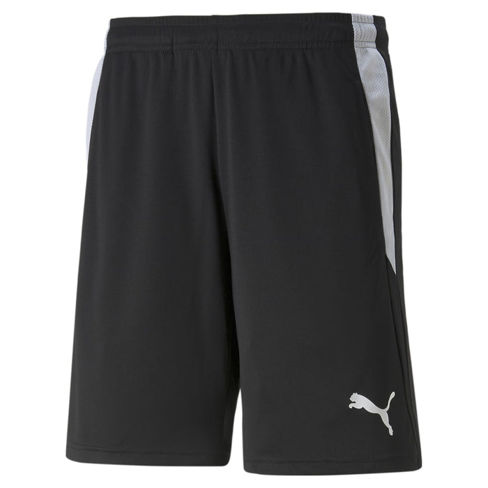 A pair of black referee shorts with side pockets and a Puma logo on the lower leg.