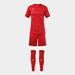 Red sports outfit with shirt, shorts, and socks on a white background
