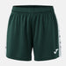 Green shorts with a white brand logo on a light gray background