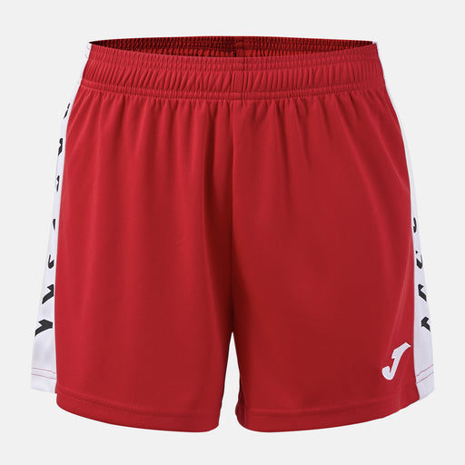 Red shorts with white side panels and a brand logo on a light gray background