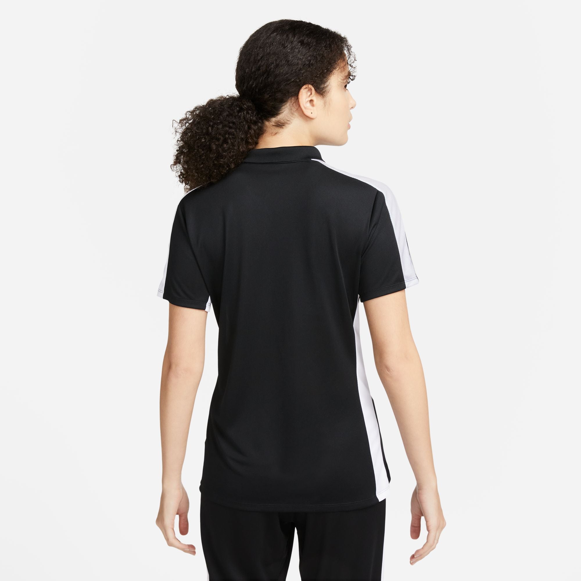 back of Nike Dri FIT Academy 23 Women's Short Sleeve Polo in black