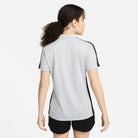 Back of Nike Dri FIT Academy 23 Women's Short Sleeve Polo in Wolf Grey/Black