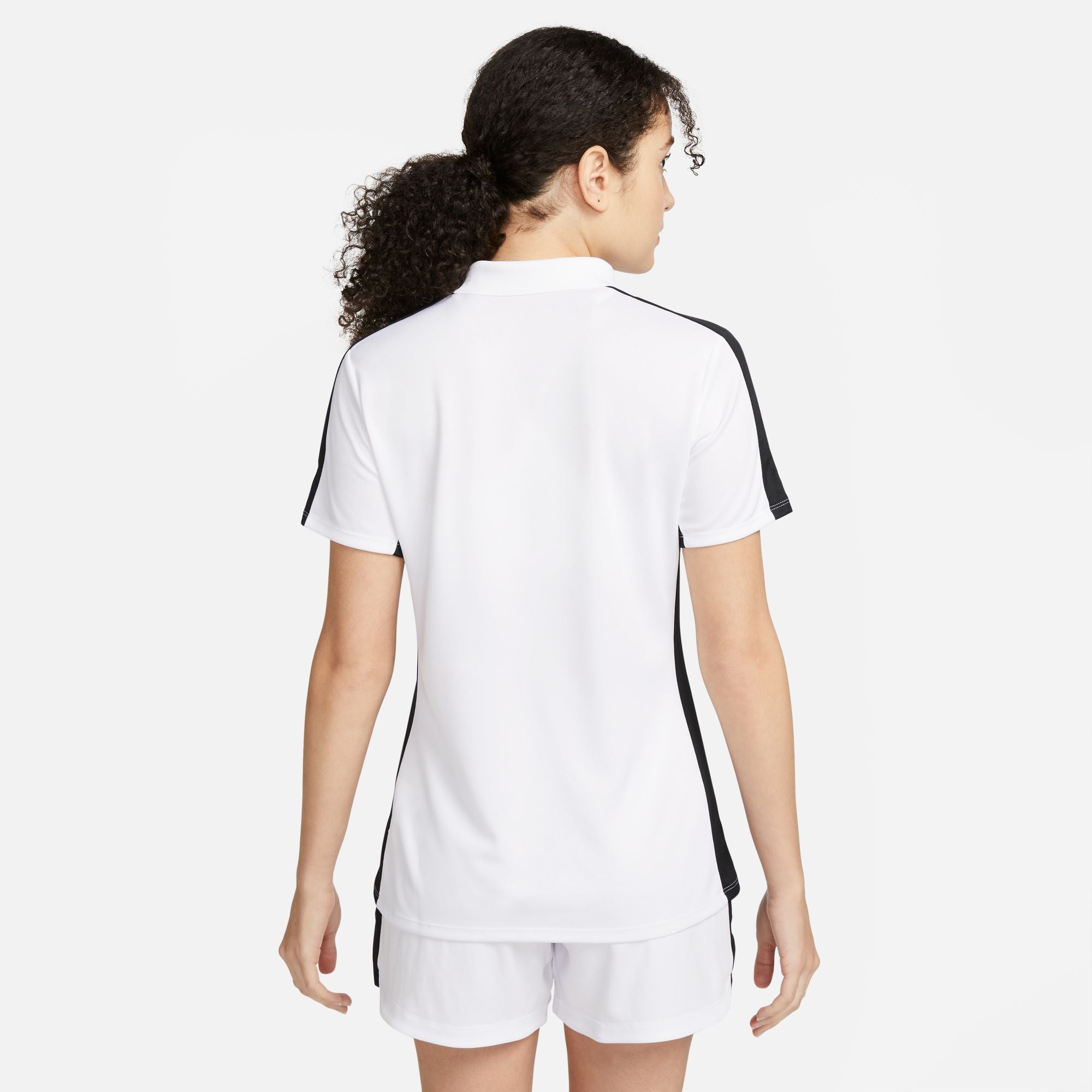 back of Nike Dri FIT Academy 23 Women's Short Sleeve Polo in White/Black