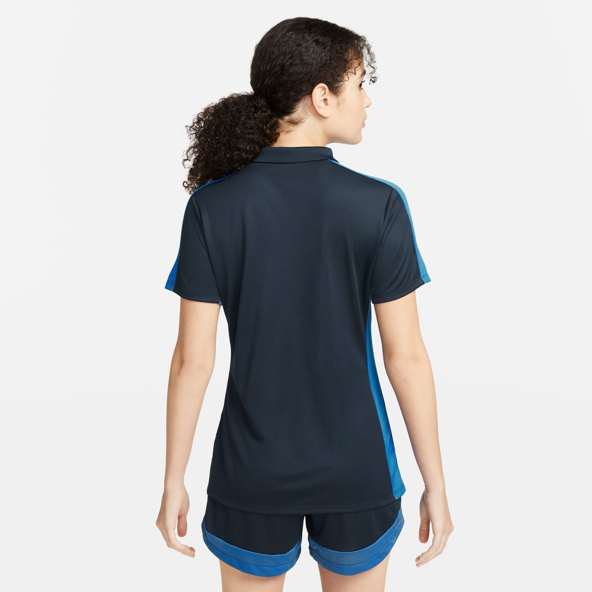 back of Nike Dri FIT Academy 23 Women's Short Sleeve Polo in Obsidian/Royal Blue