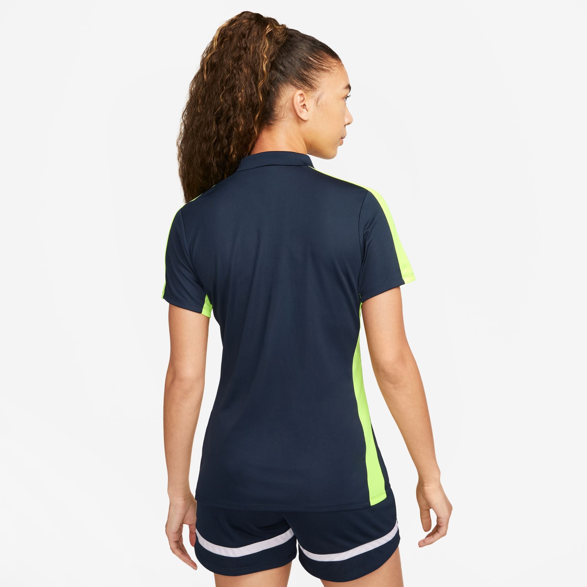 back of Nike Dri FIT Academy 23 Women's Short Sleeve Polo in Obsidian/Volt