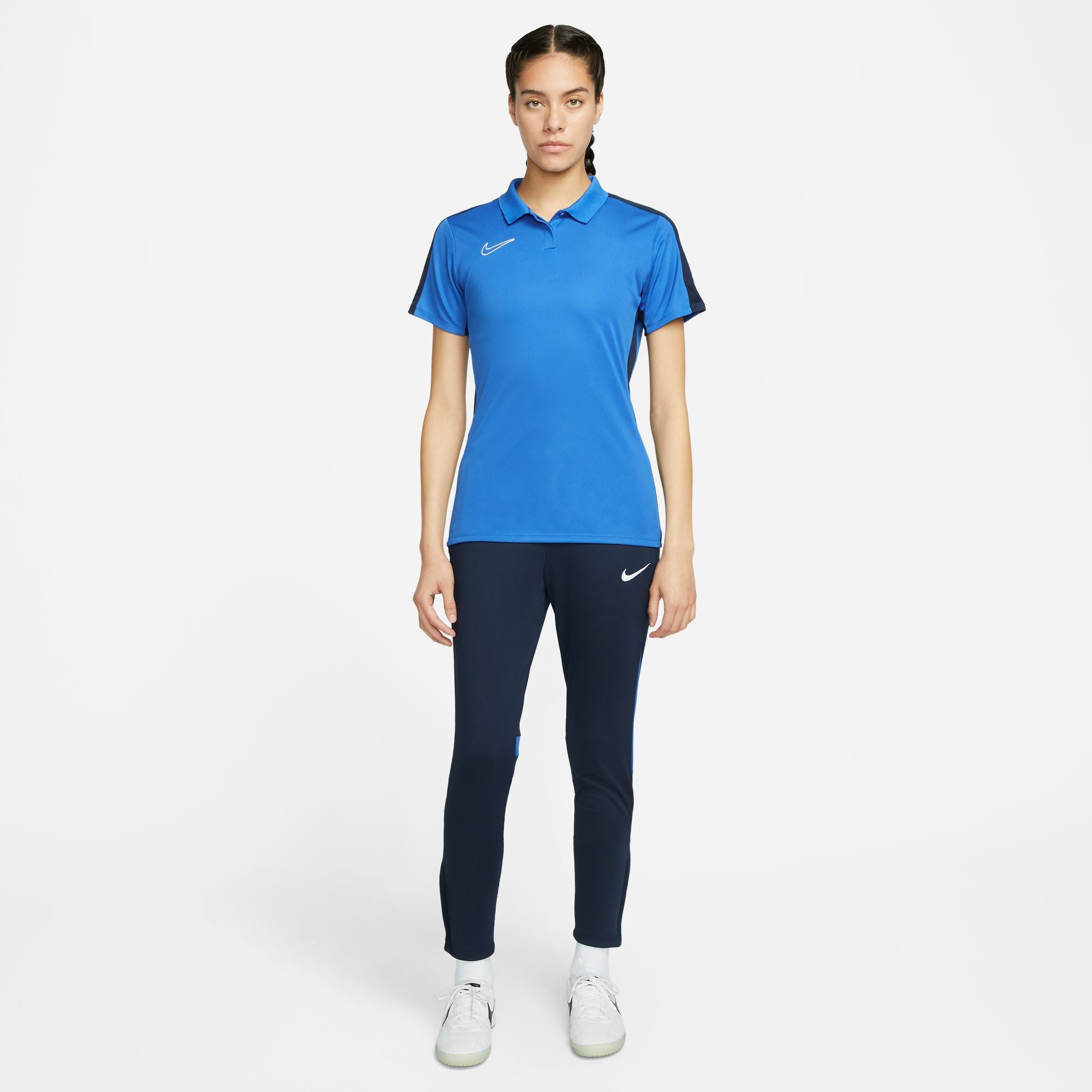 Nike Dri FIT Academy 23 Women's Short Sleeve Polo in Royal Blue/Obsidian with obsidian nike tracksuit bottoms and white nike trainers