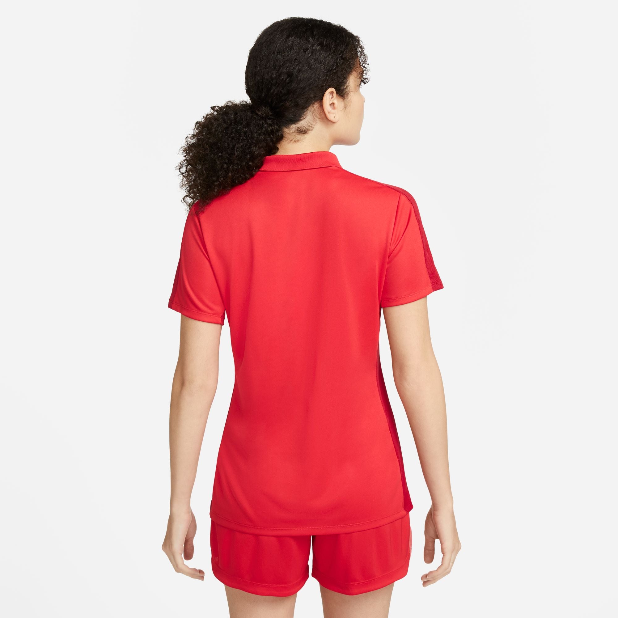 Back of Nike Dri FIT Academy 23 Women's Short Sleeve Polo in University Red/Gym Red