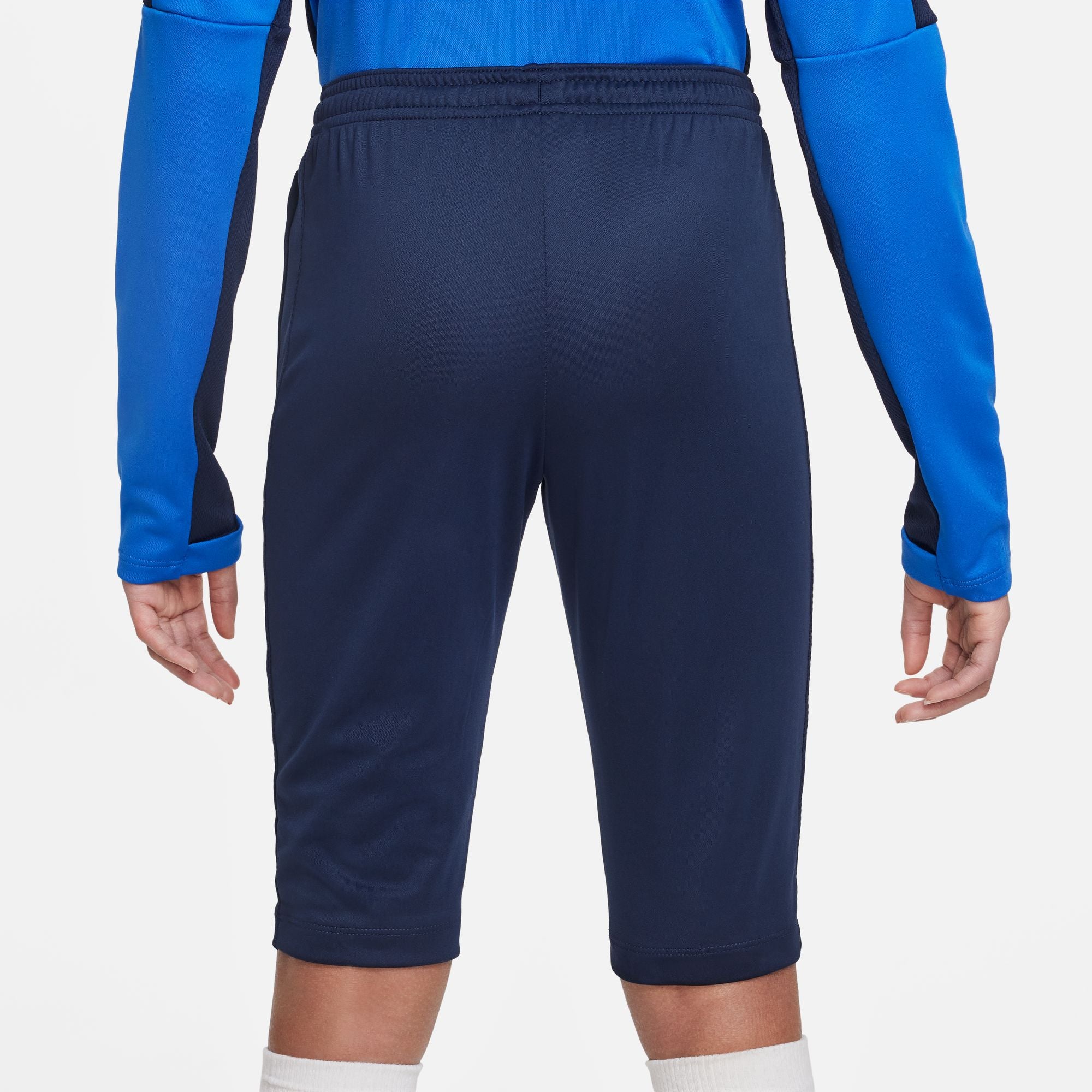 back of Nike Dri FIT Academy 23 3/4 Knit Pants in Obsidian