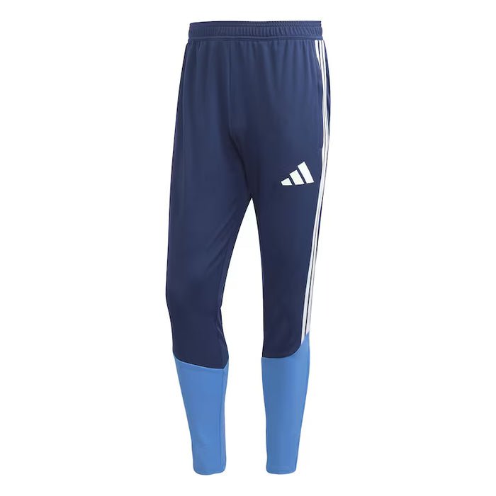 Navy and blue Adidas pants with three white stripes on a white background