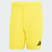 Yellow shorts with a black logo on a light gray background