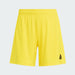 Yellow shorts with a black logo on a light gray background