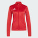 Red jacket with Adidas logo on a light gray background