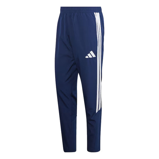 Navy blue tracksuit pants with white stripes and Adidas logo on a white background