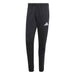 Black Adidas pants with white logo on a white background