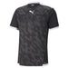 A black and white Puma soccer referee jersey with camouflage pattern and velcro pockets.