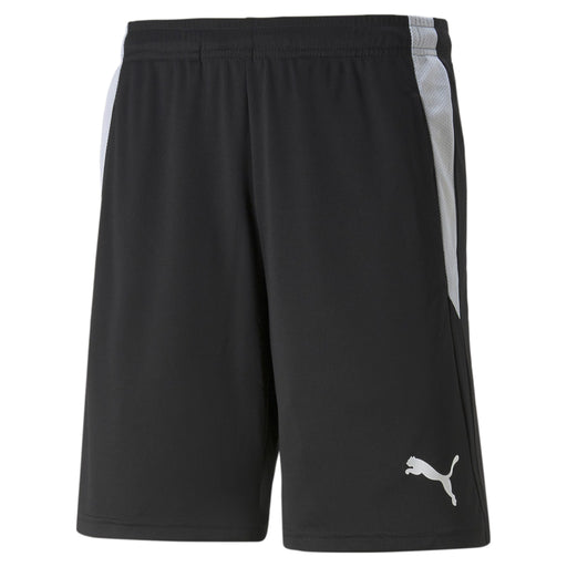 A pair of black referee shorts with side pockets and a Puma logo on the lower leg.