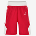 Red athletic shorts with a white logo on a white background